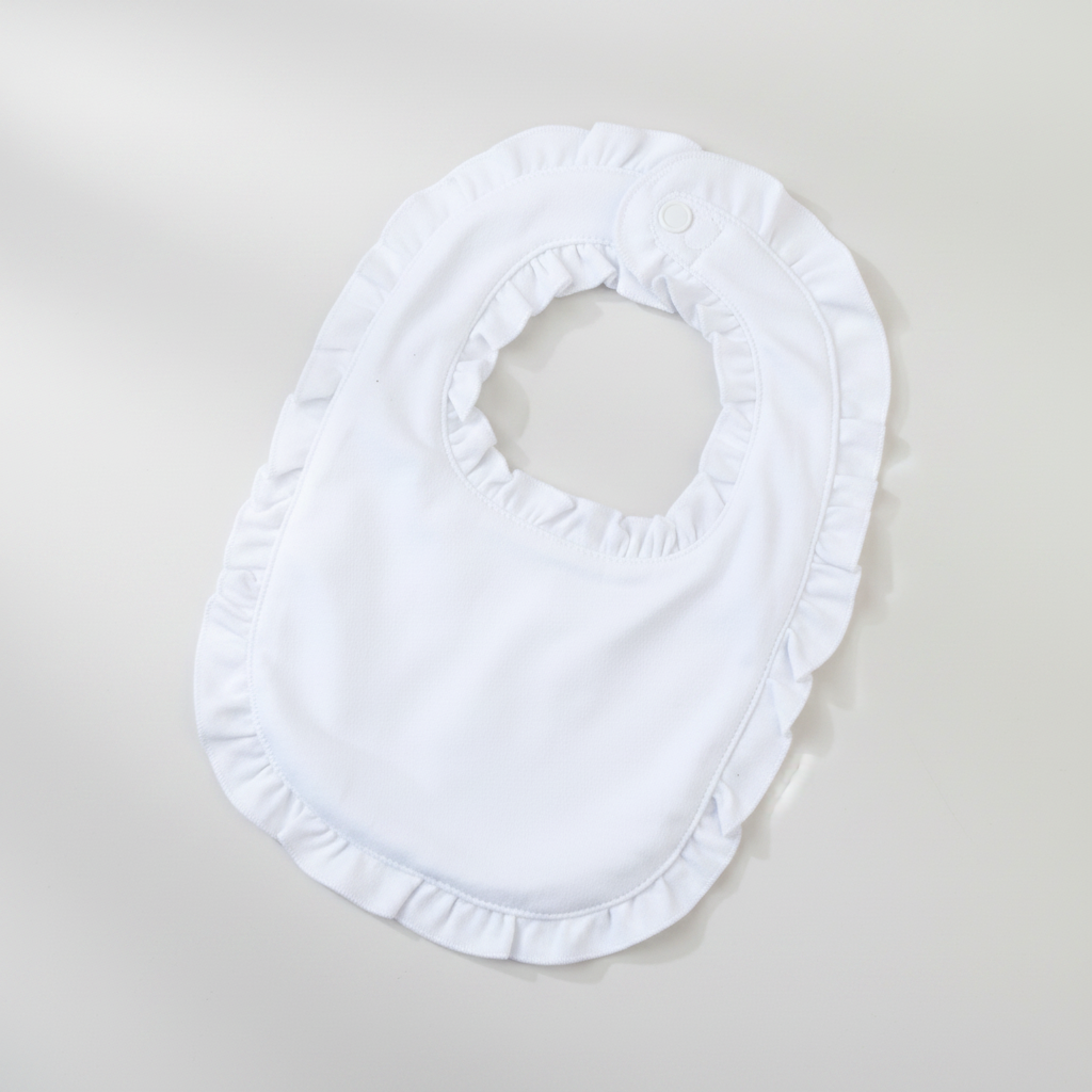 White frilly baby bib - light grey background